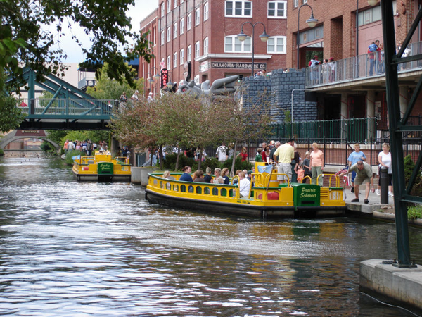 Canal in Bricktown – enjoy pleasant weather riding water taxis in this scenic waterway  Source: Wikipedia  