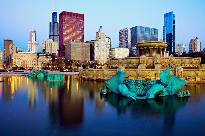 The City of Chicago’s beautiful skyline reflected in Buckingham Fountain